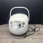 Zojirushi 5.5 Cup Fuzzy Rice Cooker White NS-WPC10. Fixed Price $74.99.