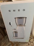 New Smeg Pastel Green 50'S Retro-style Aesthetic Coffee Grinder Box Is. Fixed Price $249.99.