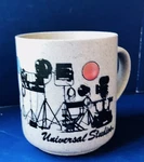 Vintage Universal Studios Souvenir Coffee Cup Director Lights Camera Action. Fixed Price $9.95.