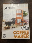 Adirchef Grab Personal Coffee Maker With 15 Oz. Travel Mug Orange. Fixed Price $27.38.