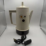 Vintage 70'S Regal Poly-perk 4-8 Cup Coffee Pot Percolator 7508 Floral Graphic. Fixed Price $24.99.