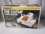 Presto Cutup Meat Vegetables Cheese Fruits Bread Knife Slicer - New Sealed. Fixed Price $59.99.