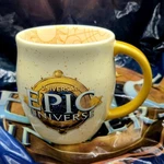 Epic Universe Universal Studios Logo Emblem Ivory Coffee Mug Cup Gold Handle New. Fixed Price $48.49.