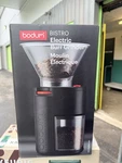 New Sealed Bodum Bistro Burr Coffee Grinder Black Conical 12 Settings. Fixed Price $35.00.