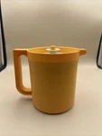 #N17- Tupperware 2 Qt Yellow Pitcher Push Button Lid Airtight 1676-1. Fixed Price $7.00.