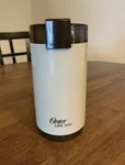 Oster Cafe Mill Coffee Grinder. Fixed Price $80.00.
