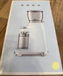 Smeg 50'S Style Aesthetic 150W Coffee Grinder - Cream CGF01CRUS. Fixed Price $239.99.