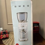 Brand New Smeg CGF01PBUS Red 50S Retro Style Coffee Grinder. Fixed Price $220.00.