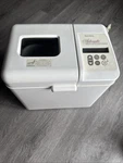 West Bend 41026 Bread & Dough Maker Timer 12 Programs 1-1.5 Lb White 520W. Fixed Price $37.50.