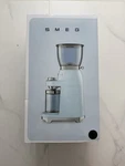 Black Coffee Grinder, Stainless Steel Burrs, Fine To Coarse Settings. Fixed Price $275.00.