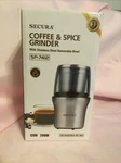 Secure Coffee & Spice Grinder Stainless Steel # 7412. Fixed Price $30.00.