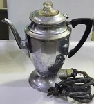 Vintage Universal Landers Frary & Clark Electric Coffee Pot Percolator E7847. Fixed Price $69.99.