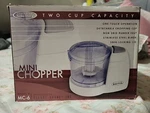 Kitchen Selectives MC-6BL Mini Chopper White, 2-CUP Capacity. Fixed Price $19.99.