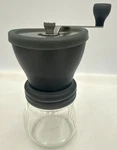 Manual Coffee Grinder Adjustable Ceramic Burr Glass Jar Stainless Steel Handle. Fixed Price $12.00.