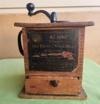 Sun No. 1080 One Pound Coffee Mill. Tall Lap Type Grinder.. Fixed Price $42.26.