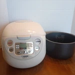 Zojirushi NS-WPC10 5.5 Cup Fuzzy Rice Cooker And Warmer White. Fixed Price $49.97.
