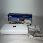 Oster Electric Knife And Case With Stainless Steel Carving Fork Model 2802. Fixed Price $23.00.