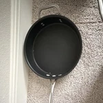 Calphalon Non-stick Black Aluminum Three-piece Saucepan Set Dishwasher Safe. Fixed Price $150.00.