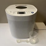 Breadmaker Oster Expressbake 2LB White Ivory 12 Settings CKSTBRTW20 W/ Manual. Fixed Price $59.99.