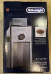 Delonghi Coffee Burr Grinder New And Unopened Factory Sealed. Fixed Price $49.99.
