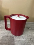Vintage Tupperware 1.5 Quart Pitcher Maroon 1575-3 With Push Button Lid. Fixed Price $16.00.